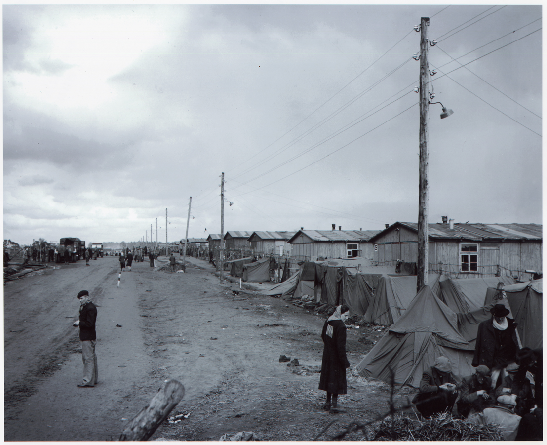 Huts along the street through the Bergen-Belsen concentration camp, 28 April 1945. Photo by Sgt. Curtis, U.S. Army Signal Corps. NARA, Washington DC.